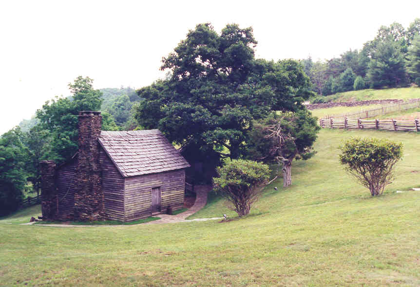 cabininvalleywithfence.jpg